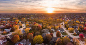 large neighborhood in fall with some homes needing a geothermal heat pump