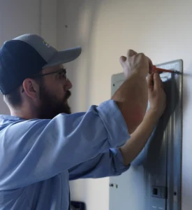 Holtzople's electrical technician Braxton fixing electrical problems