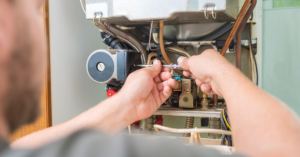 HVAC professional performing a furnace repair