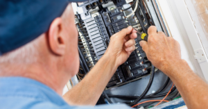 electrician performing an electrical panel upgrade