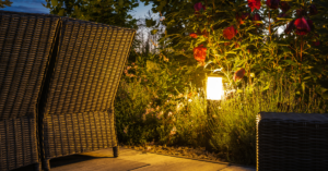 Small patio with an outdoor lighting installation 