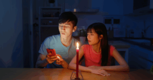 Couple experiencing a power outage 