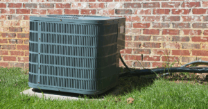 Air conditioner outside of a brick residential home
