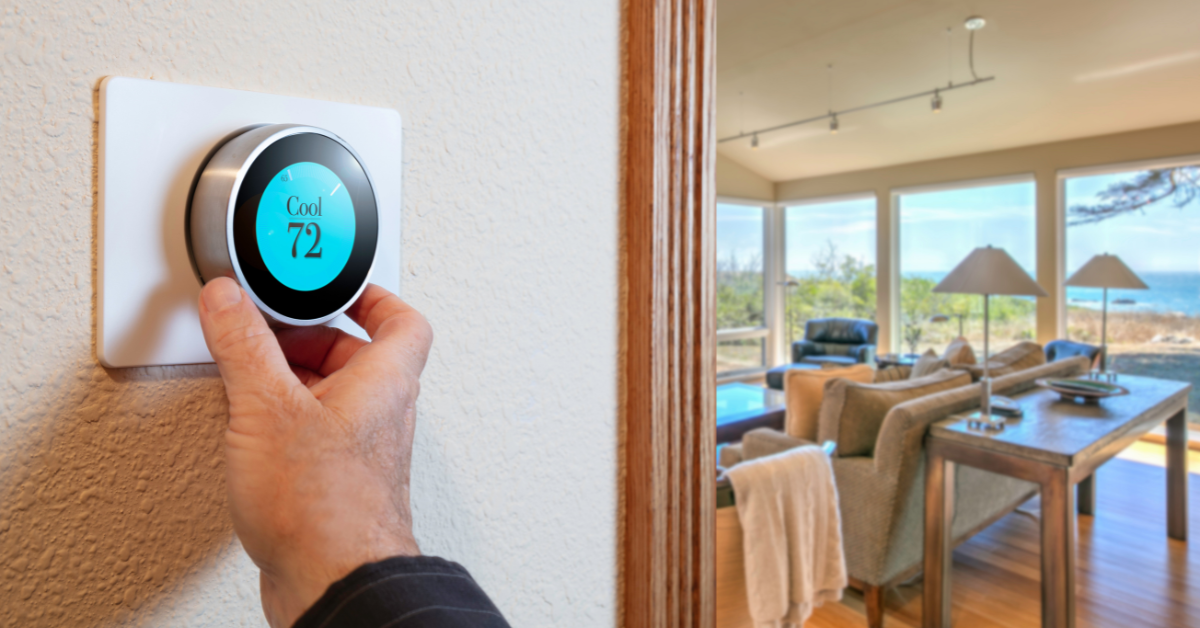 A man adjusting the temperature of his smart thermostat