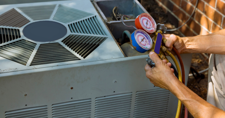 An AC tune-up being performed by an HVAC professional