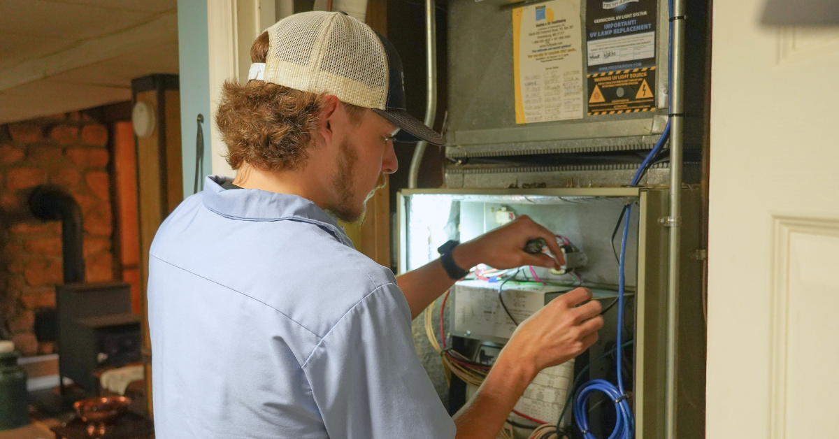 Holtzople technician Tyler performing maintenance